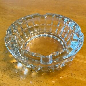 heavy glass ashtray.